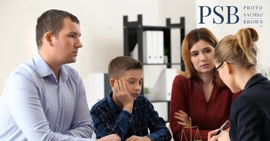 family talking to a lawyer